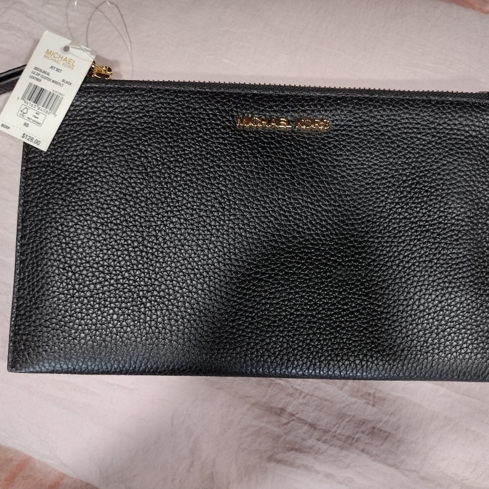 BNWT Michael Kors jet black pebble leather wristlet.